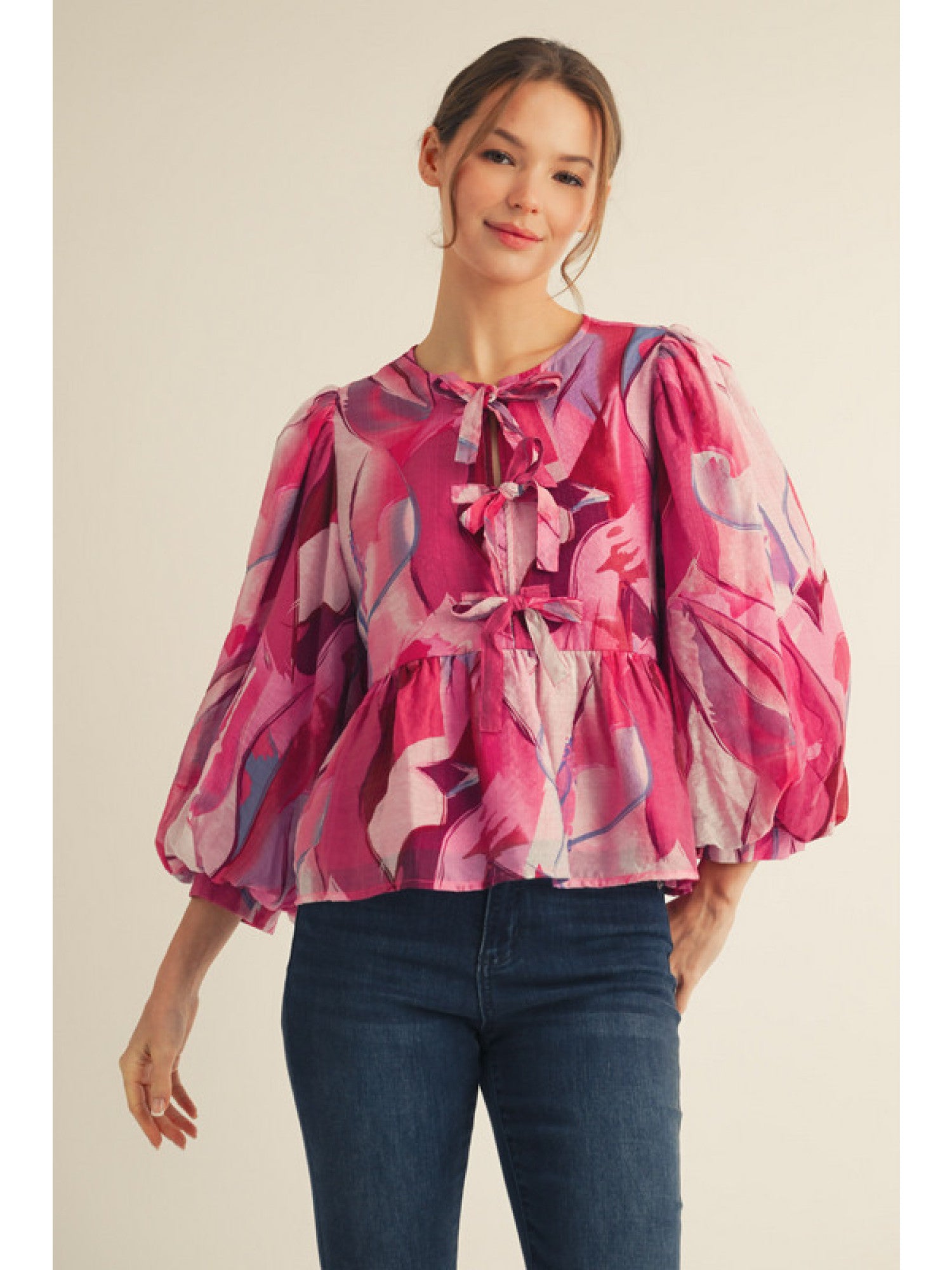 Pink Abstract Bow Peplum